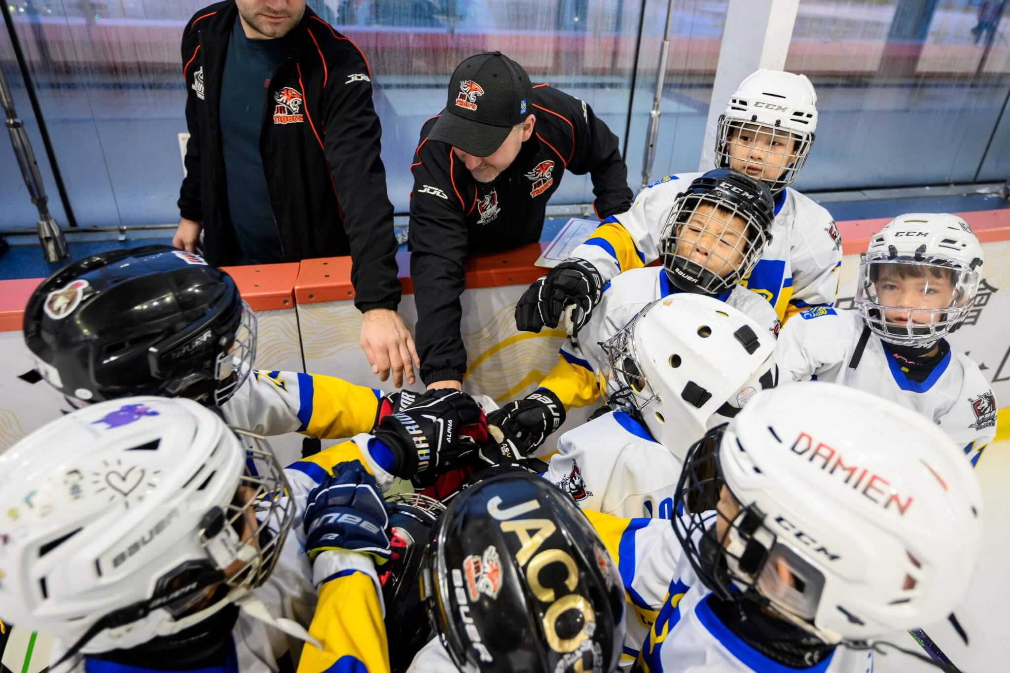 Players team cheering up at Hockey Program