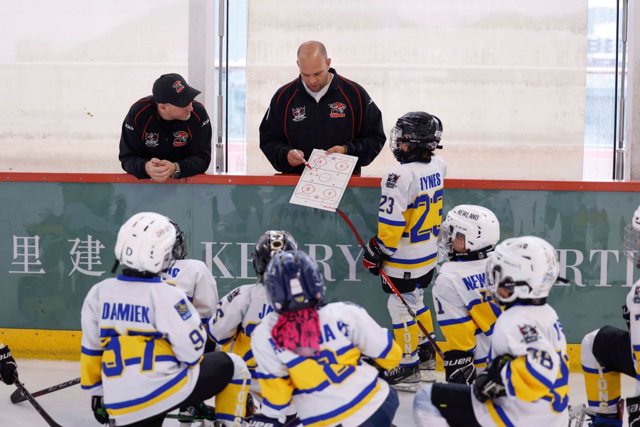 A coach explaining a strategy